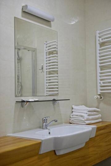 Фото номера Стандартный двухместный номер с 2 отдельными кроватями Отель Hotel Jamajka г. Вонгровец 4