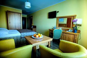 Фото номера Двухместный номер Делюкс с 1 кроватью Отель Hotel Pietrak г. Вонгровец 6