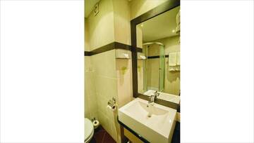 Фото номера Двухместный номер Делюкс с 1 кроватью Отель Hotel Pietrak г. Вонгровец 4
