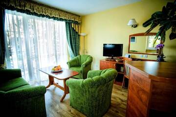 Фото номера Стандартные апартаменты (для 2 взрослых) Отель Hotel Pietrak г. Вонгровец 4